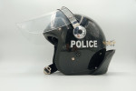 Police helmet with metraquilate cap